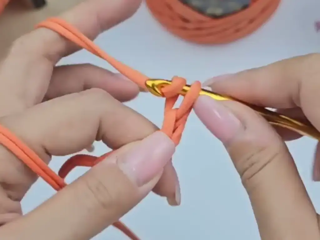 Step 1 of the trapezoid crochet bag pattern: starting the base with chain stitches
