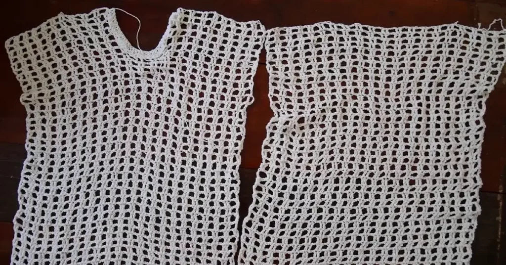 Close-up image showing the intricate stitch work of the crochet beach cover up.