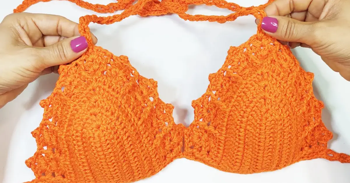 A free crochet bikini top pattern for beginners, featuring a simple and stylish design with a fan stitch detail.