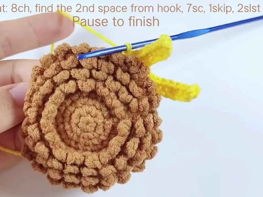 First layer of petals for the crochet sunflower, forming a solid base.