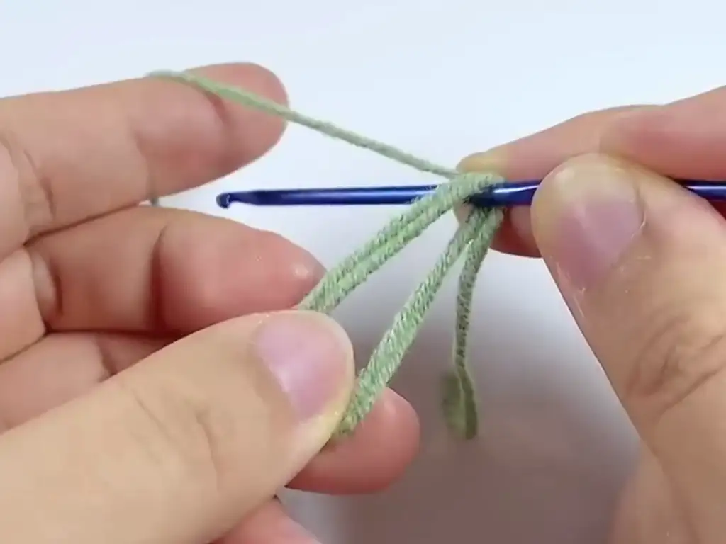 Optional crochet leaves added to the sunflower for embellishment.