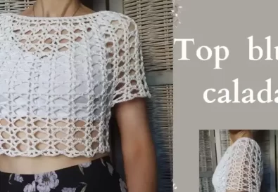 A woman models a stylish white crochet lace top paired with jeans, showcasing a casual summer outfit idea.