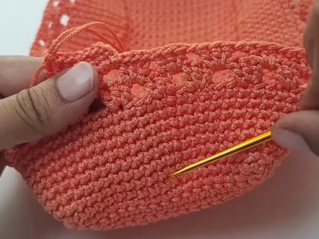 Time to introduce our eye-catching pattern! These strategically placed holes add visual interest and breathability.