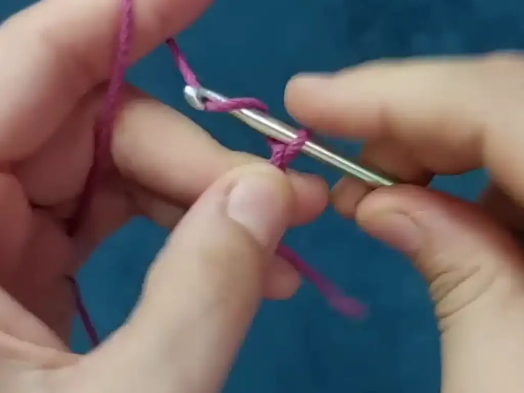 Starting the crochet chain stitch for the spaghetti bag.