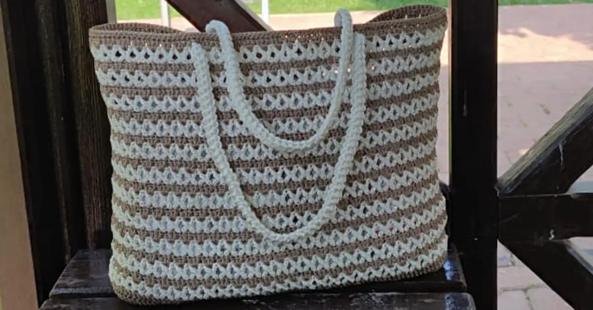Stylish cream and brown crochet tote bag with macrame rope handles, perfect for summer.