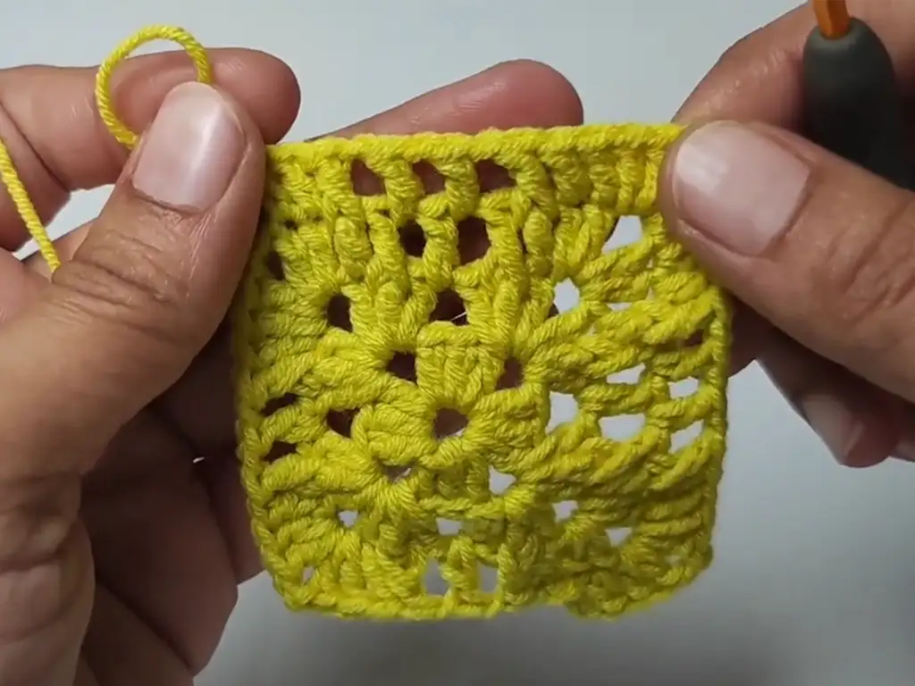 The final round of a granny square, ready to be finished off with a slip stitch and yarn tail.