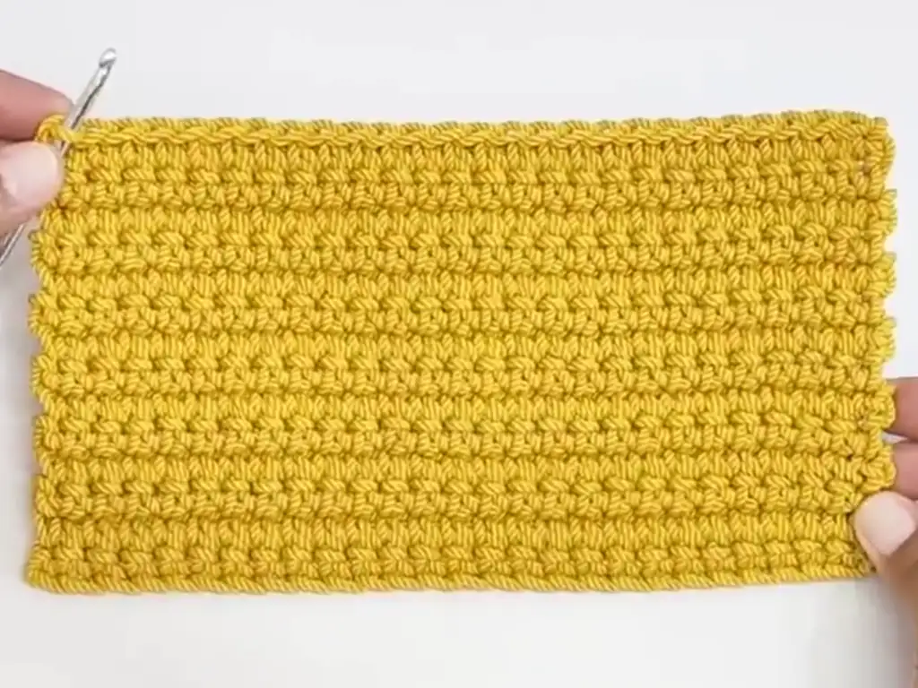 The finished rectangular base of the crochet bag.