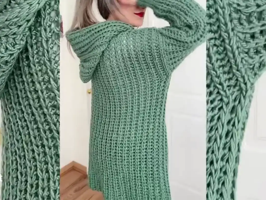A model wearing the completed crochet hooded cardigan, showcasing its fit and style.