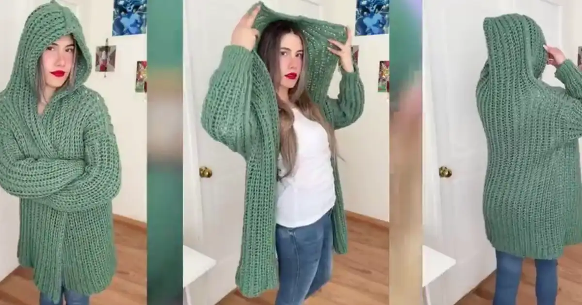 Crochet hooded cardigan pattern in a soft green color, worn by a woman to show the overall design.