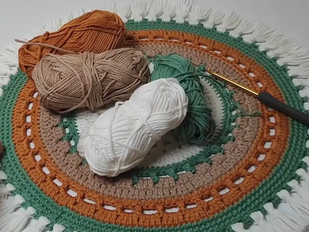 Materials needed for the crochet placemat project: yarn and hook.