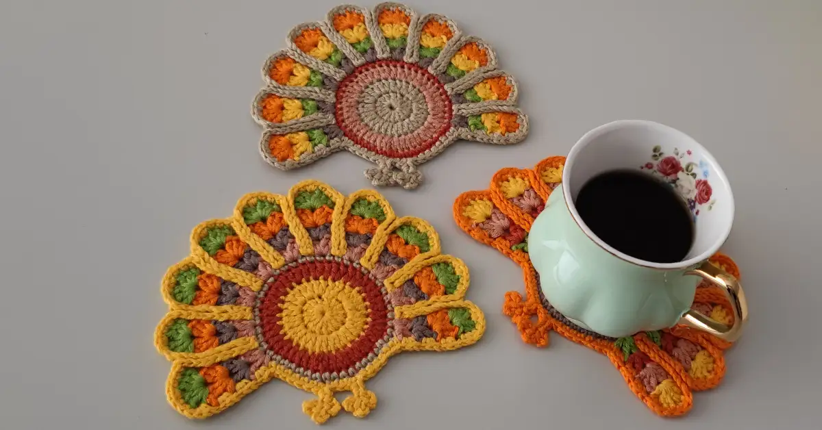 completed crochet turkey coasters, showcasing variations in color choices.