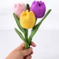 easy crochet tulip bouquet made with handmade crochet flowers and wire leaves