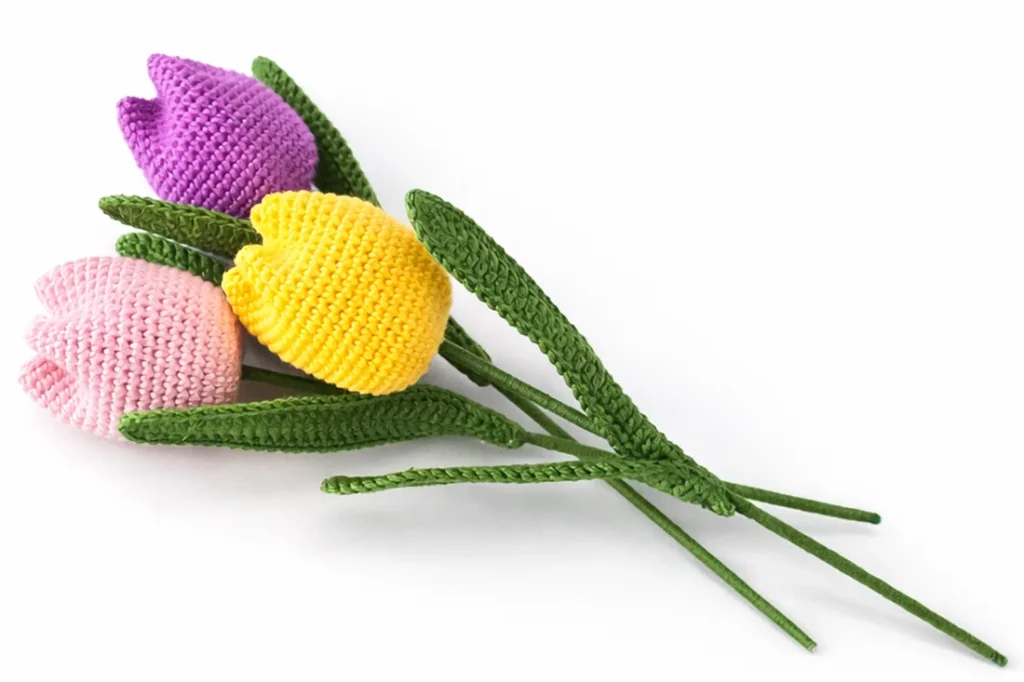 easy crochet tulip bouquet finished project with three handmade tulip flowers

