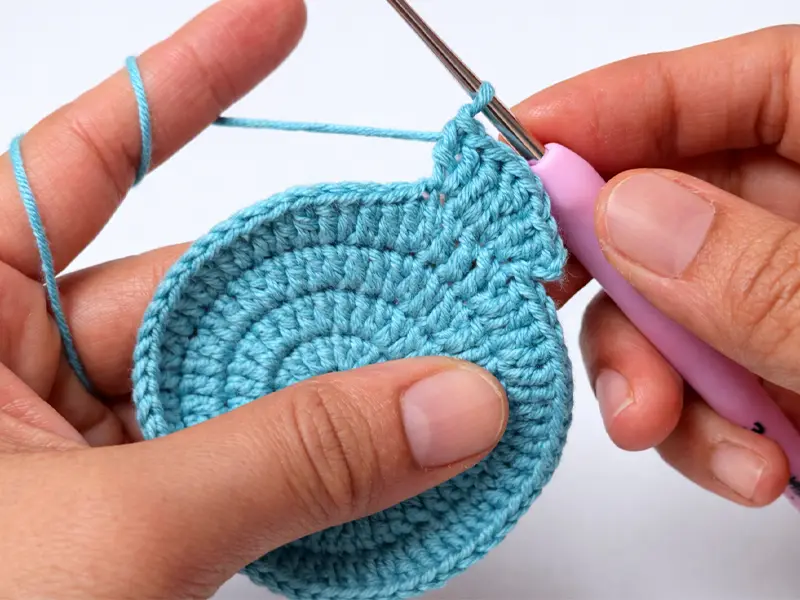 Crochet bunny ear step close up showing stitches for shaping ears for beginners