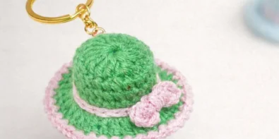 Easy crochet hat keychain made with green and pink cotton yarn
