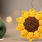 easy crochet sunflower keychain pattern with puff stitch petals and brown center for beginners