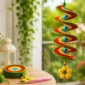 Easy crochet wind spinner hanging in a bright home decor setting with colorful spiral design, beads, flower detail, scrap yarn, and crochet hook