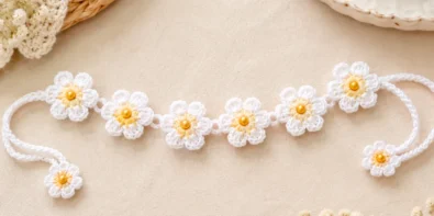 Crochet daisy bracelet with beaded flower centers