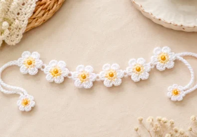 Crochet daisy bracelet with beaded flower centers